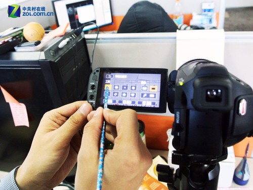 想用锤子打老板? 佳能DV帮您实现梦想